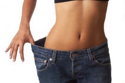Loose jeans held out at the waist